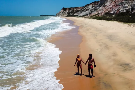 Casal nas praias de Arraial d'ajuda, Porto Seguro